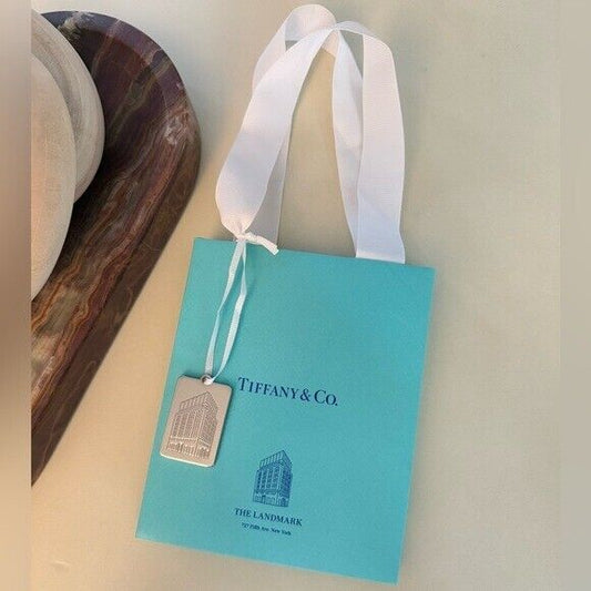 Tiffany & Co. Landmark Shopping Bag and Silver Bag Charm