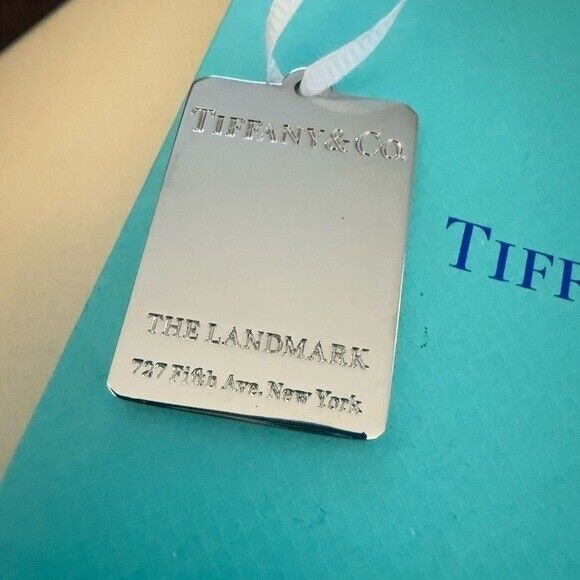 Tiffany & Co. Landmark Shopping Bag and Silver Bag Charm
